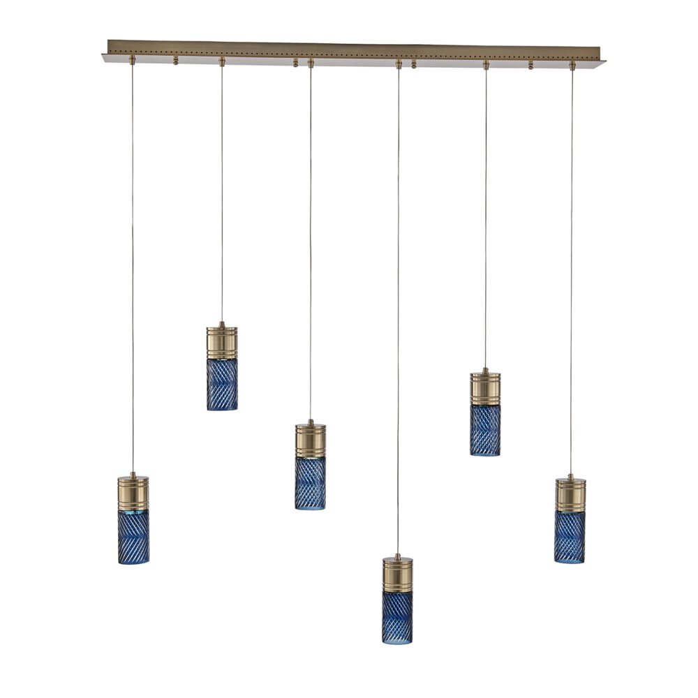 KALCO Lighting specification linear pendant fixture in Winter Brass finish installed over an island